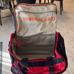 Timberland Red and Black Duffel Bag